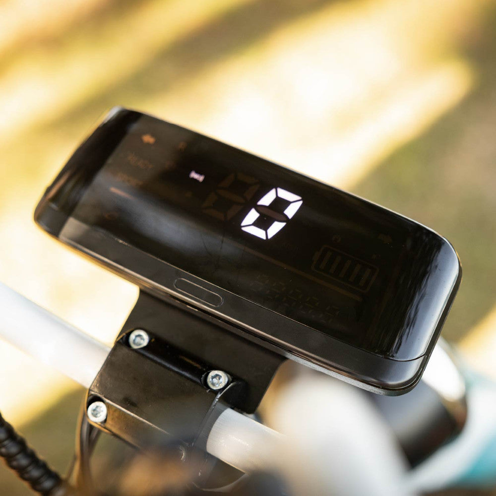 Digital display on cruzer handlebars with a blurred background