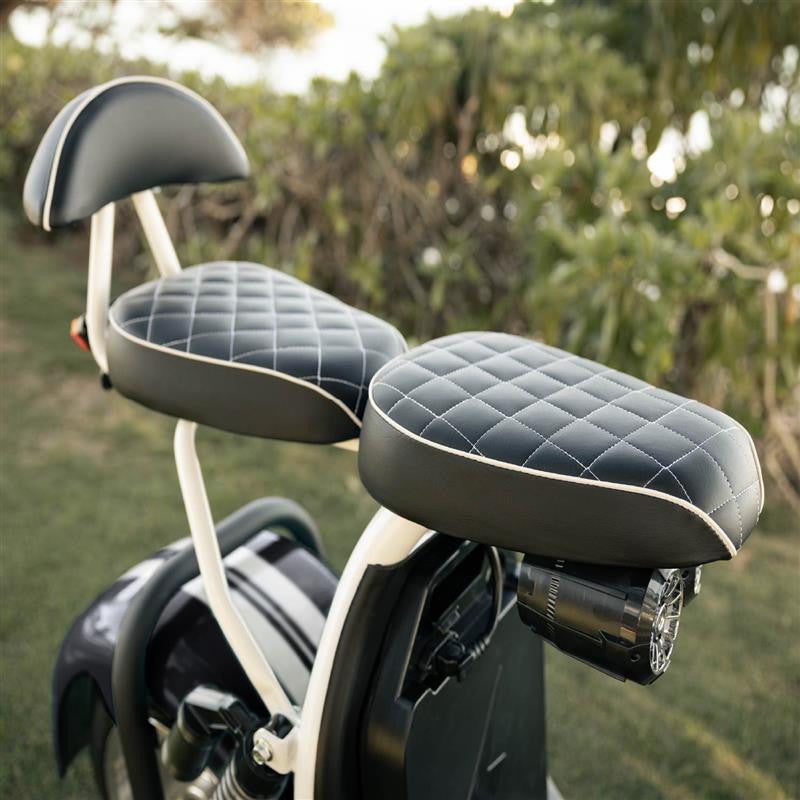 Motorcycle seat with quilted design in a natural setting
