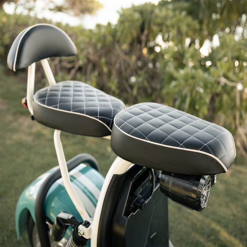 Close-up of a cruzer seat with quilted design in an outdoor setting